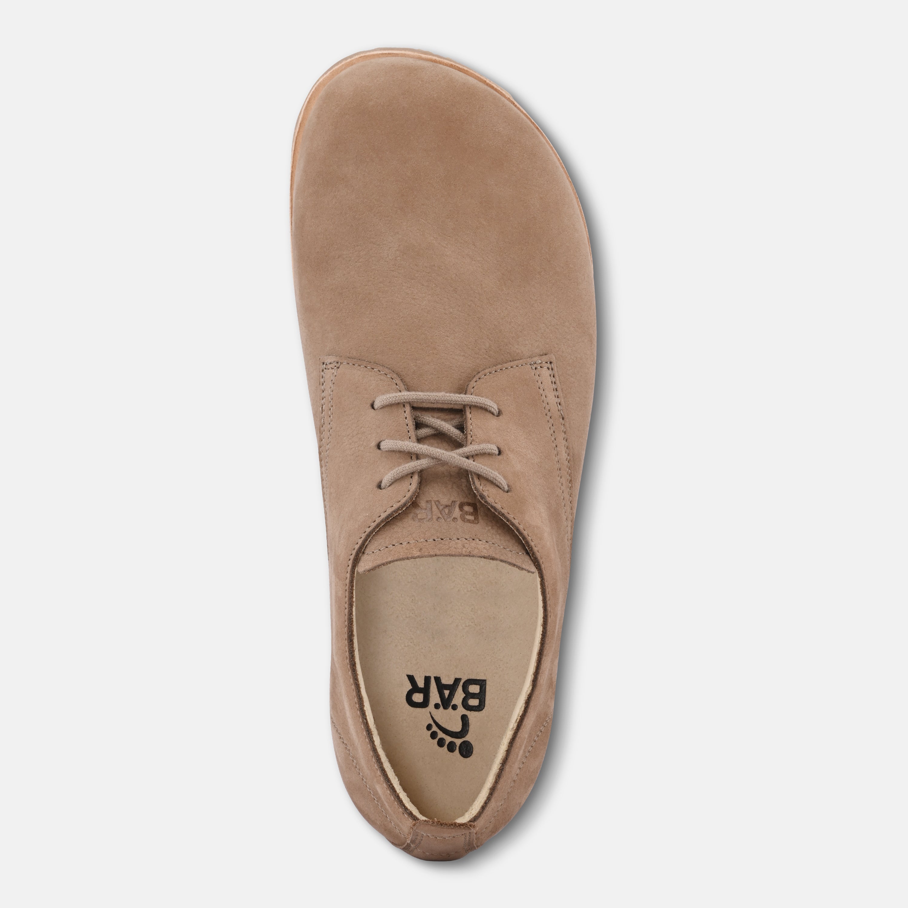 Tan suede shoe with laces on a light gray background