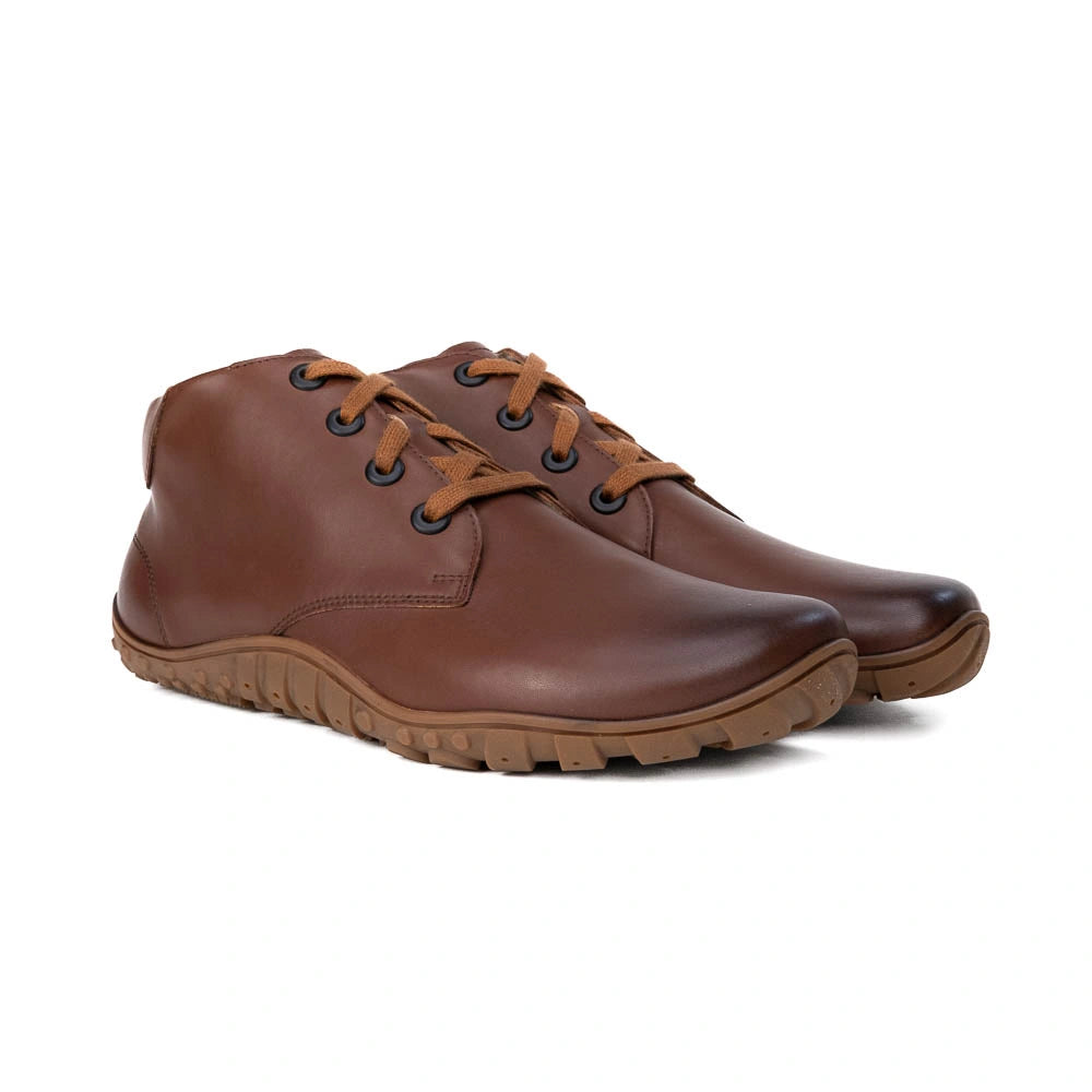 Pair of brown leather shoes on a white background