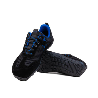 Black and blue athletic shoes on a white background