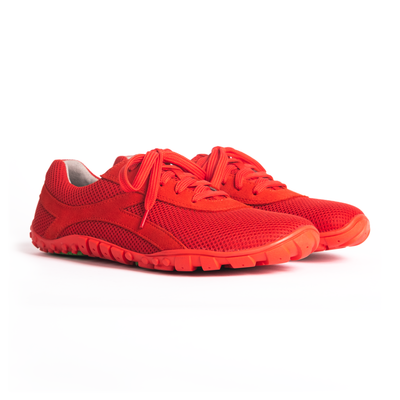 A pair of red barefoot shoes designed for both men and women with a textured upper and a thick sole.