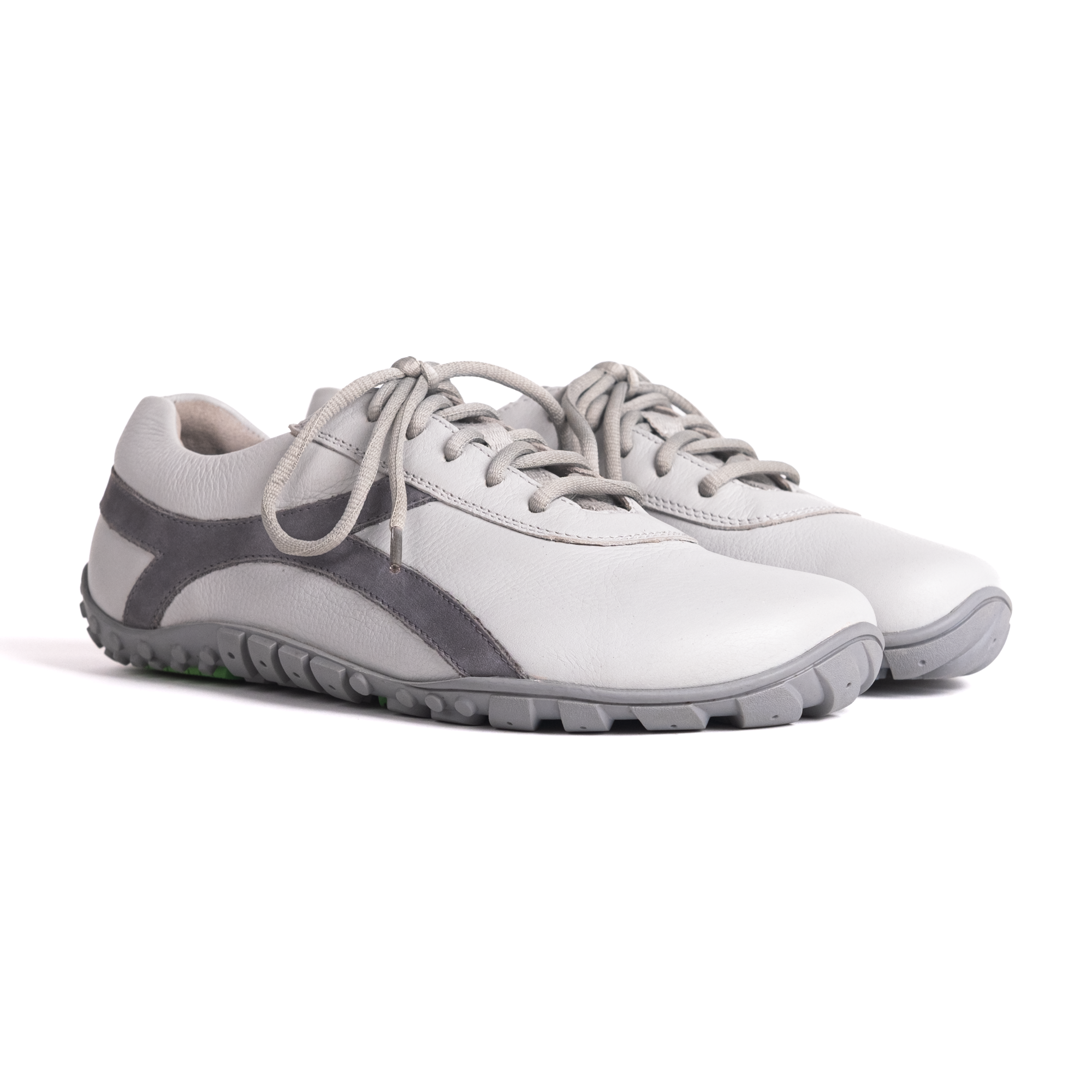 A pair of gray Bear NeXGen barefoot shoes with laces and Vibram sole, designed for both men and women.